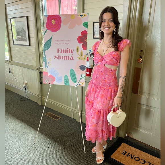 Revolve Likely Dress Size 6
Pink floral, ruffle, cutout - Picture 2 of 4